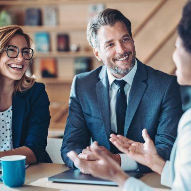 Business persons talking in the office